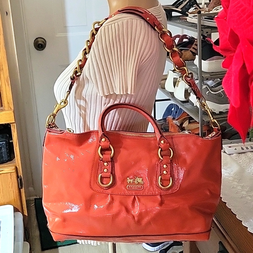 Coach Madison Audrey handbag, salmon pink color.